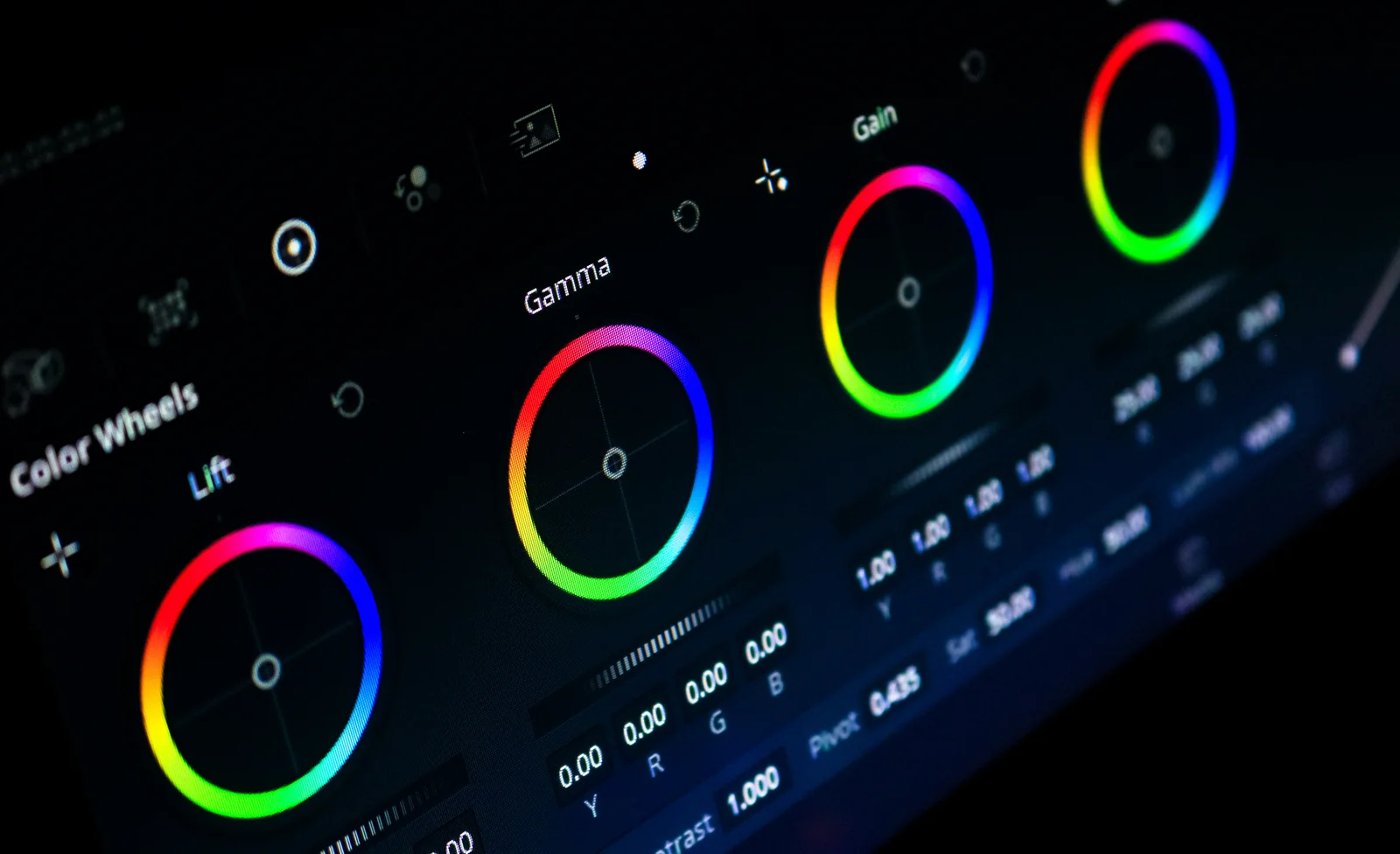 Color grading wheel on a dark control surface