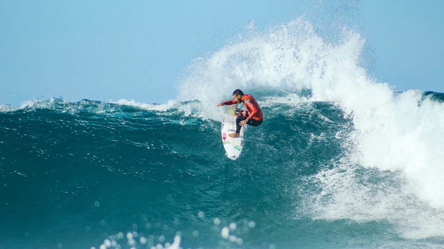 Surfer carving a wave, untouched before grading